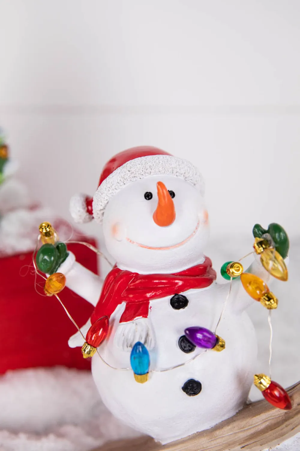 Decorator's Warehouse 7.4” B/O Lighted Resin Skiing Snowman with Light String > Christmas Decor|Christmas Accents