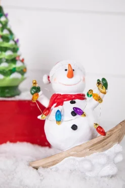 Decorator's Warehouse 7.4” B/O Lighted Resin Skiing Snowman with Light String > Christmas Decor|Christmas Accents