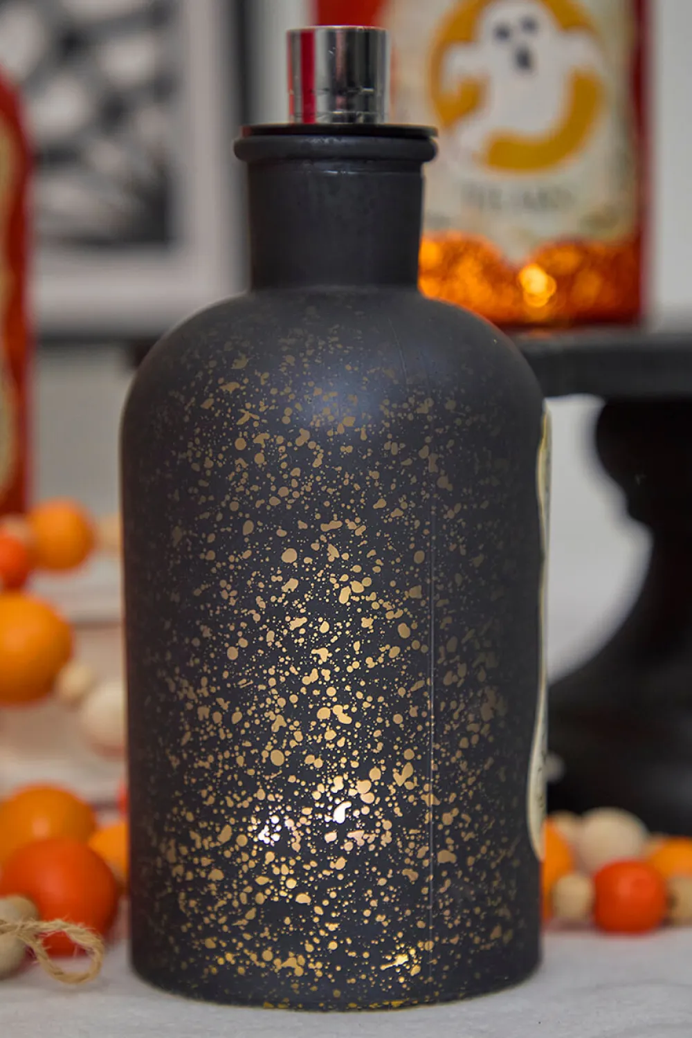 Decorator's Warehouse 7"H B/O Lighted Glass Halloween Bottle Luminary > Halloween|Halloween